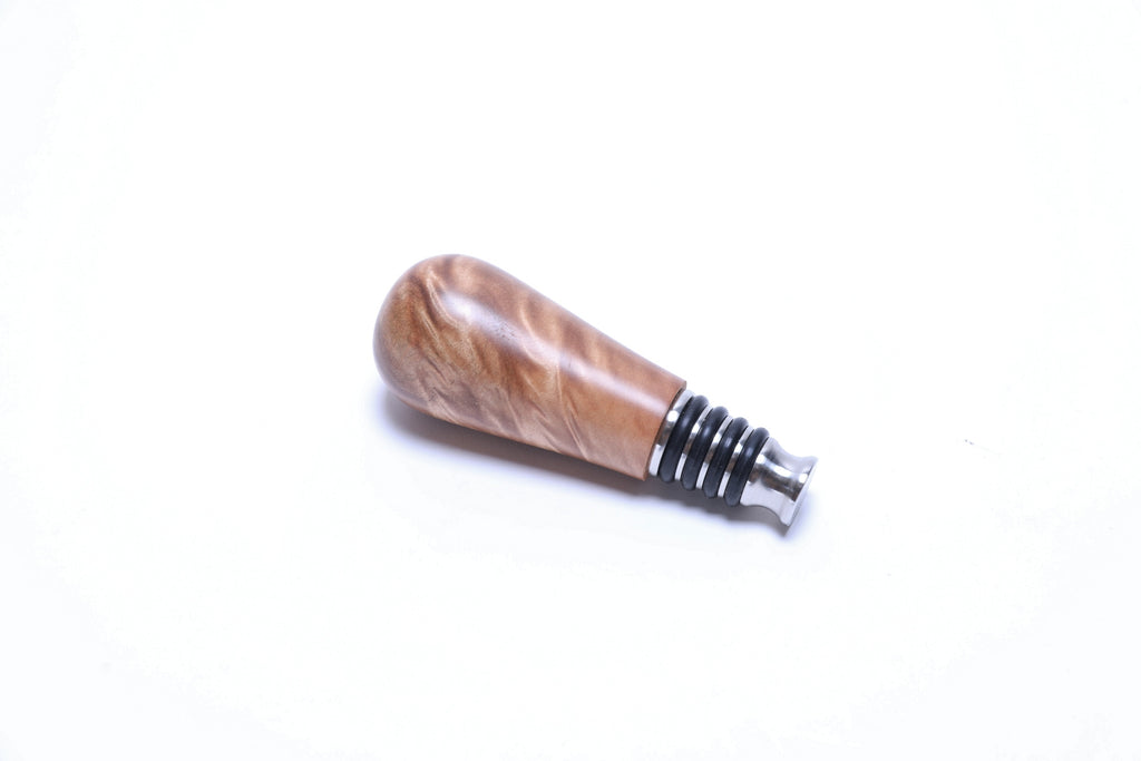 Handmade maple burl stopper angle view showing food-safe finish and craftsmanship