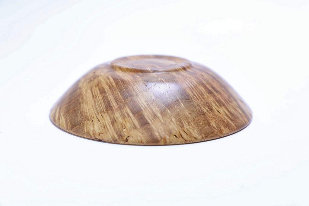 "Small mulberry burl bowl upside down angle shot displaying canary yellow tones and unique figure
