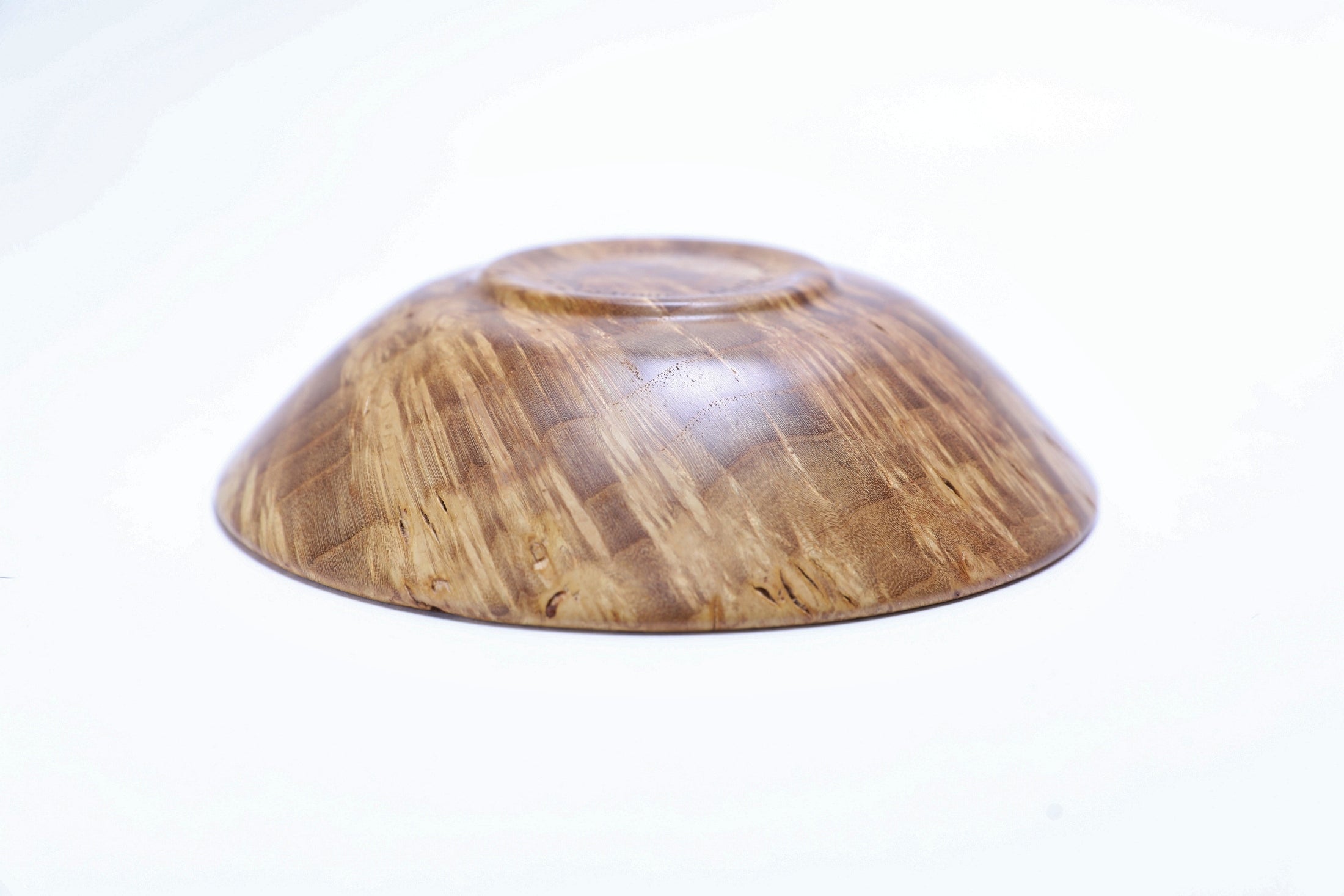 "Small mulberry burl bowl upside down angle shot displaying canary yellow tones and unique figure
