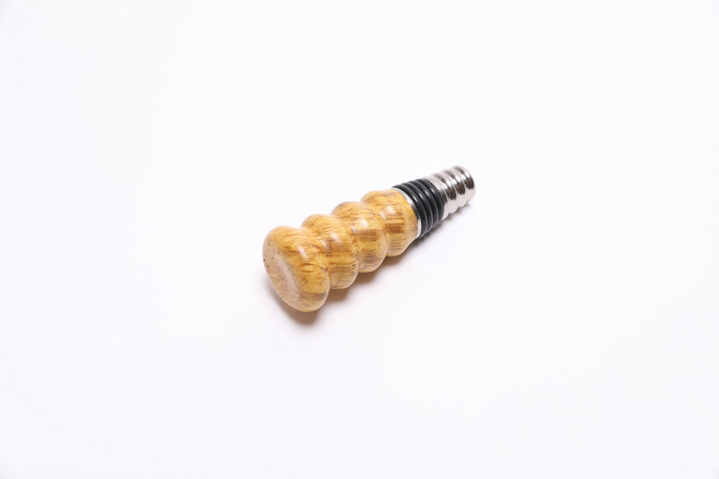 "Mulberry burl wooden wine stopper top view highlighting iridescent rays and burl pattern