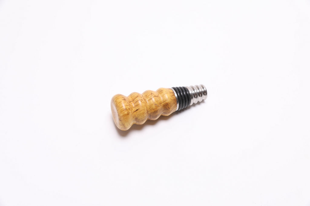 Handmade mulberry burl stopper angle view showing food-safe natural oil finish
