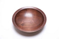 Wild black walnut wooden bowl 9 3/4 inches showing red undertones and chocolate grain patterns