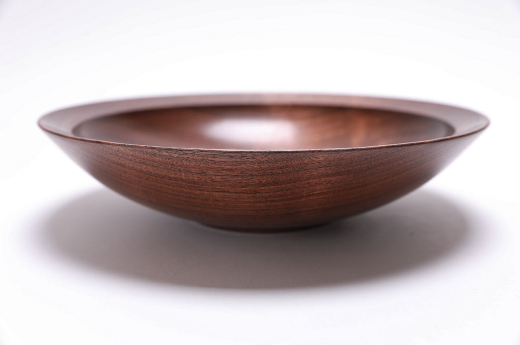 Wild black walnut bowl upside down showing rim and craftsmanship detail