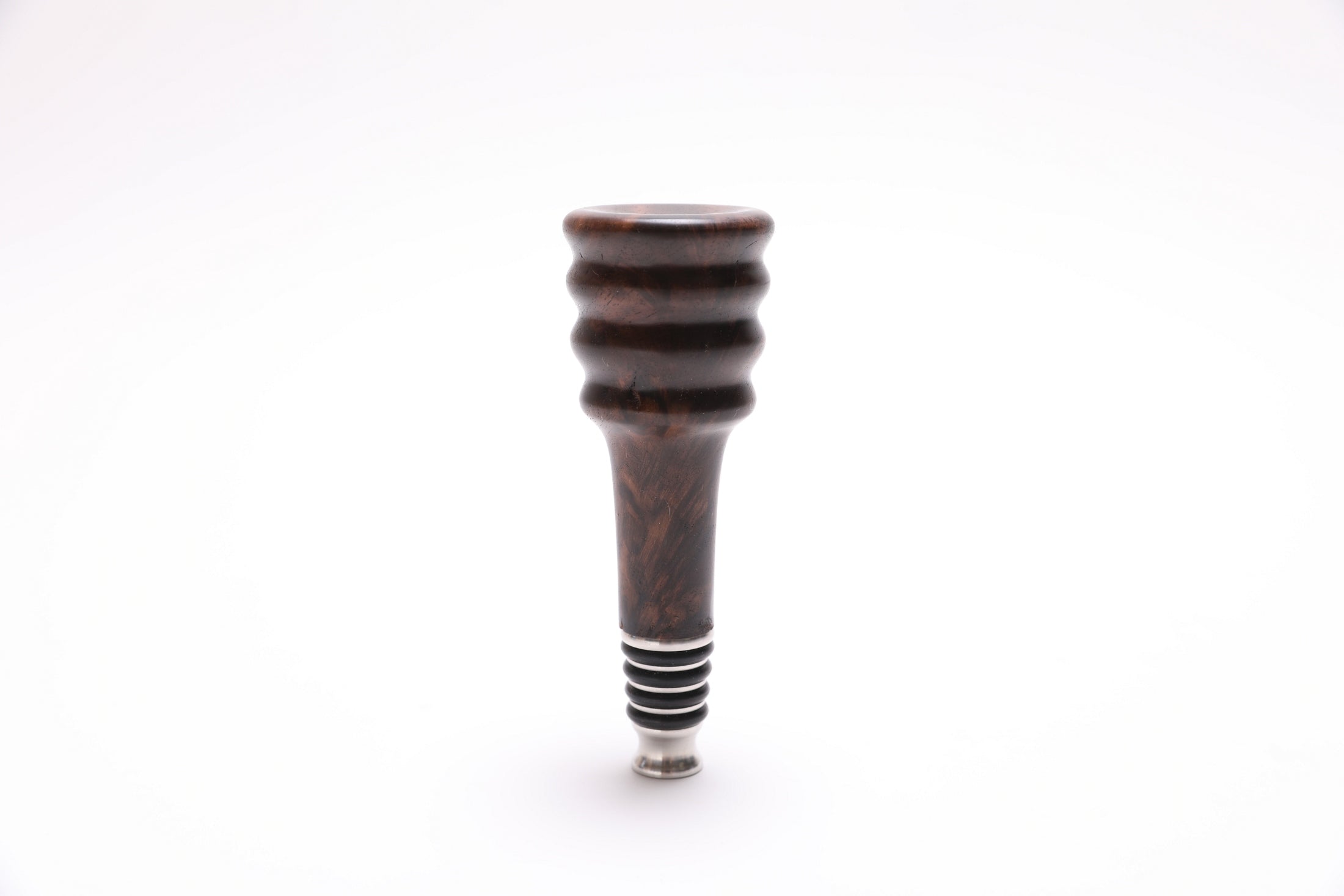 Claro walnut burl wine stopper with amber and chocolate coloration, handcrafted by Sanders Woodworking
