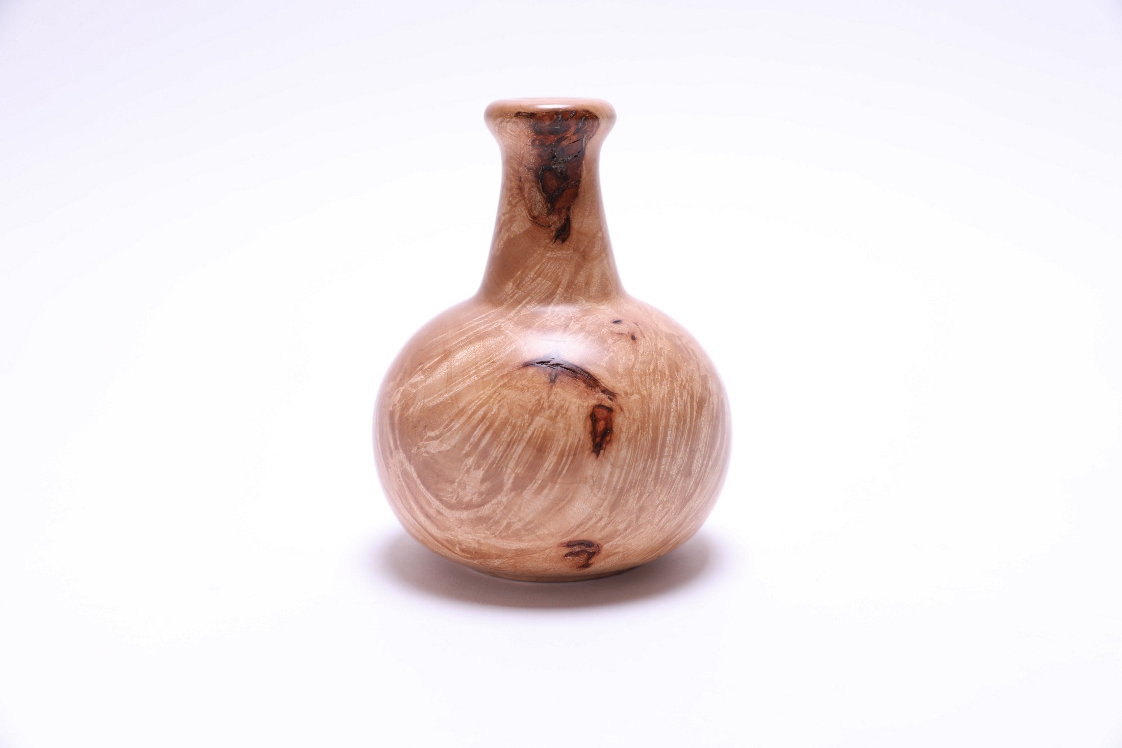 Detail view of big leaf maple burl weed pot with food-safe natural oil finish
