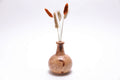 Big leaf maple burl weed pot with swirling rays and bark inclusions, handcrafted by Sanders Woodworking
