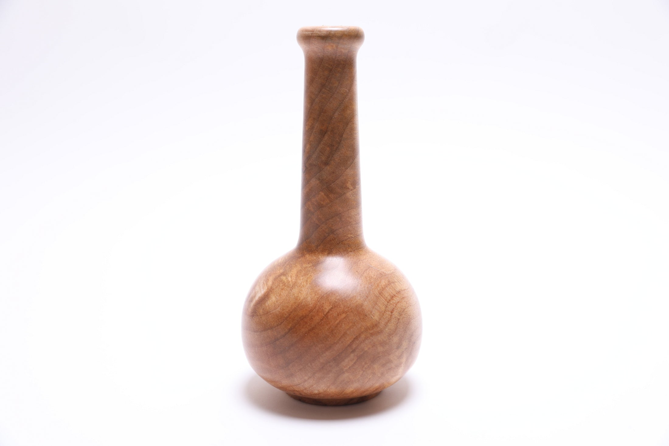 Side view of big leaf maple burl weed pot highlighting unique wood grain