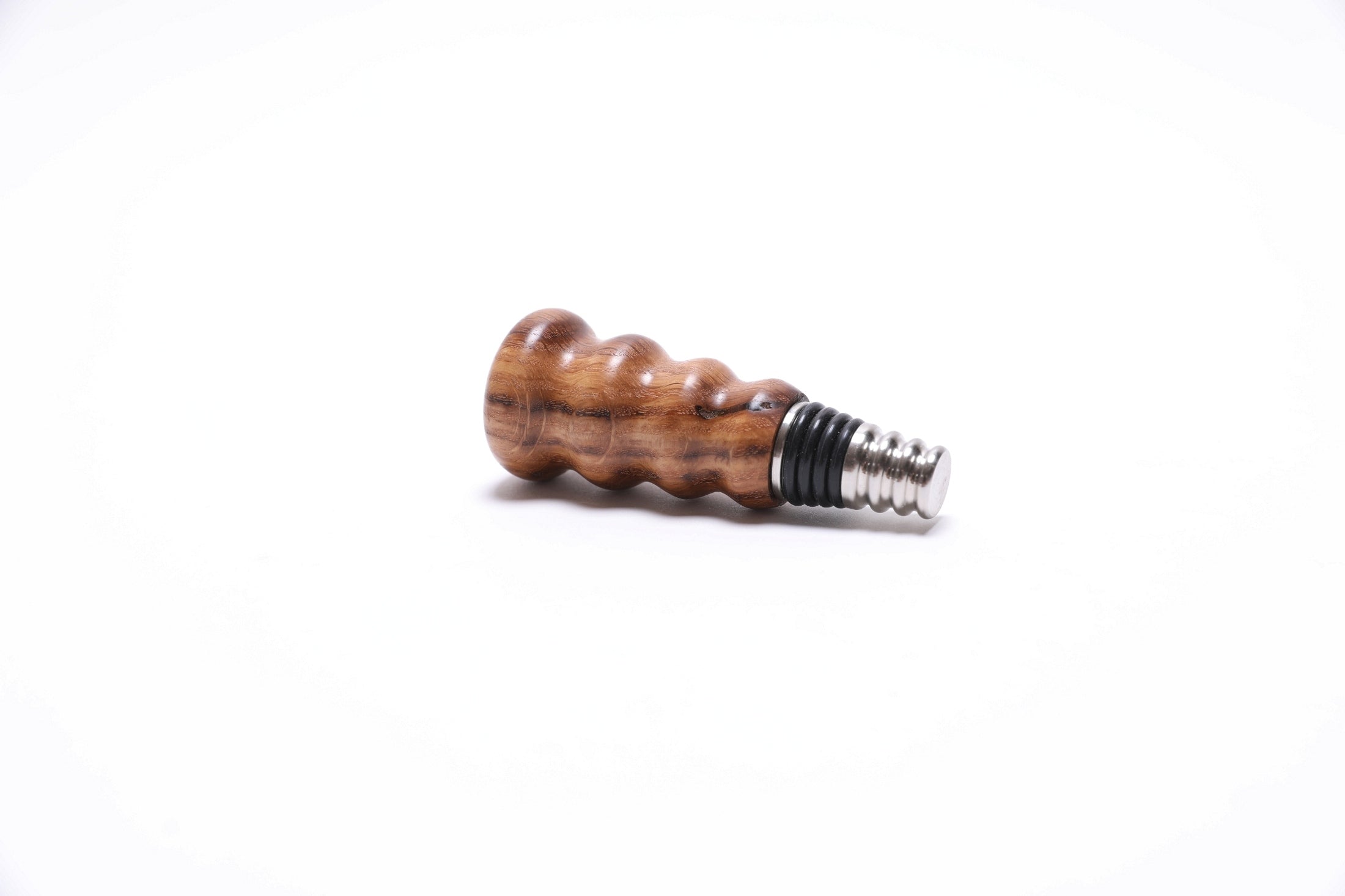 Side view of white oak wine bottle stopper with premium stainless steel base

