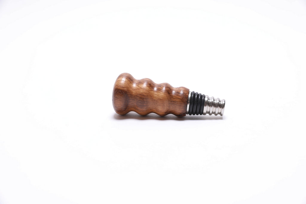 Side view of white oak wine stopper showing natural wood grain detail