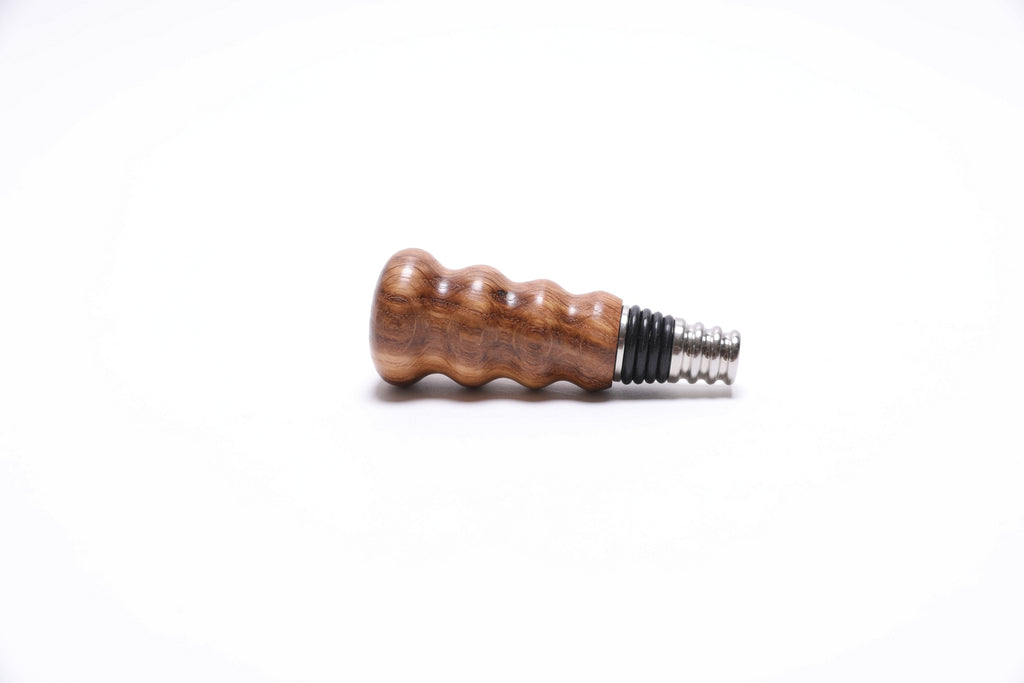 Detail view of handmade white oak wine stopper with food-safe finish