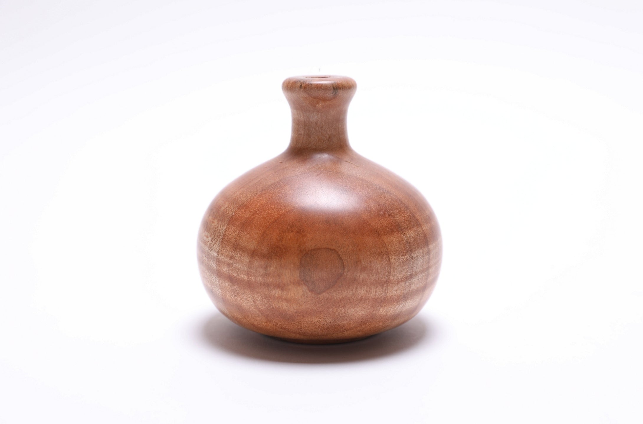 Handcrafted tiger maple dry vase showing natural tiger stripe figure from Pacific Northwest