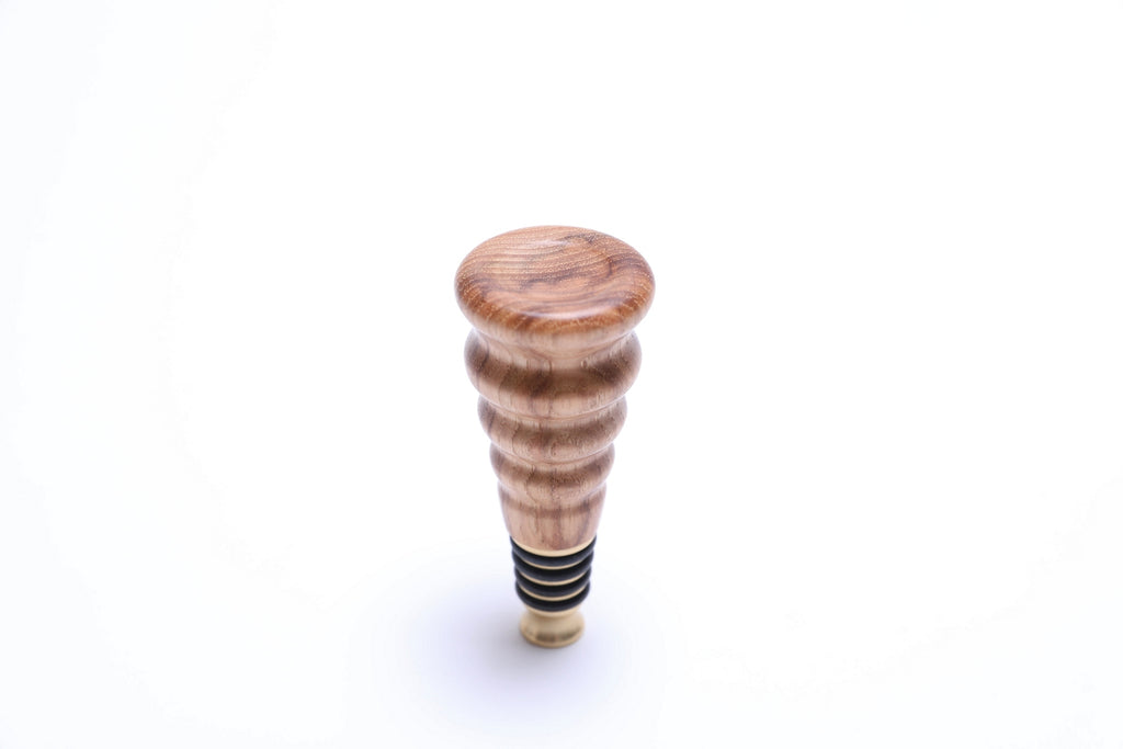 Top view of handmade hickory wine stopper with food-safe finish