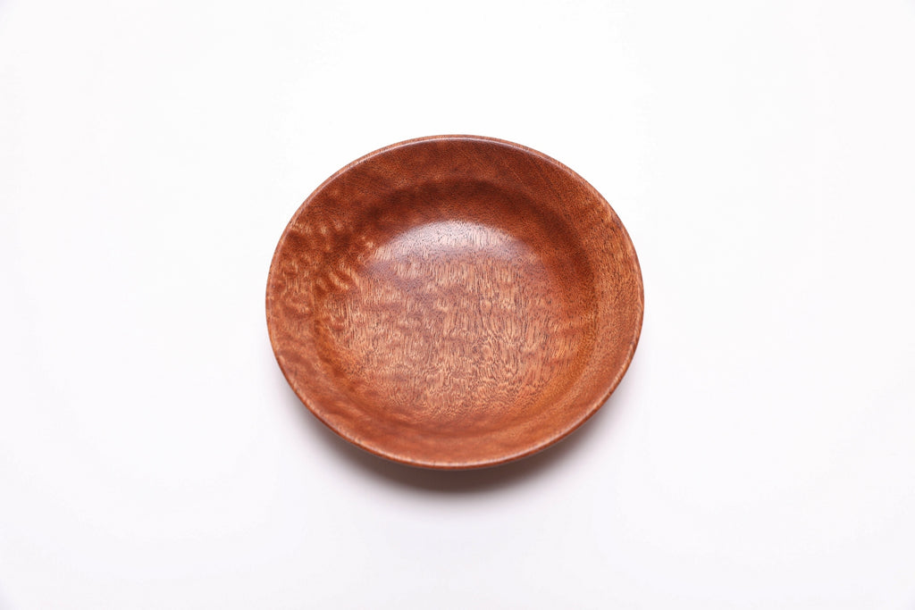 Wooden ring dish with curved taper and undercut rim detail
