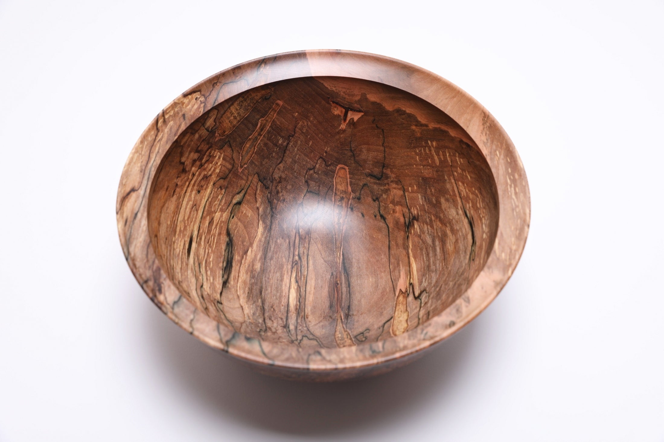 Top view of handcrafted spalted maple bowl showing intricate spalting patterns and figure