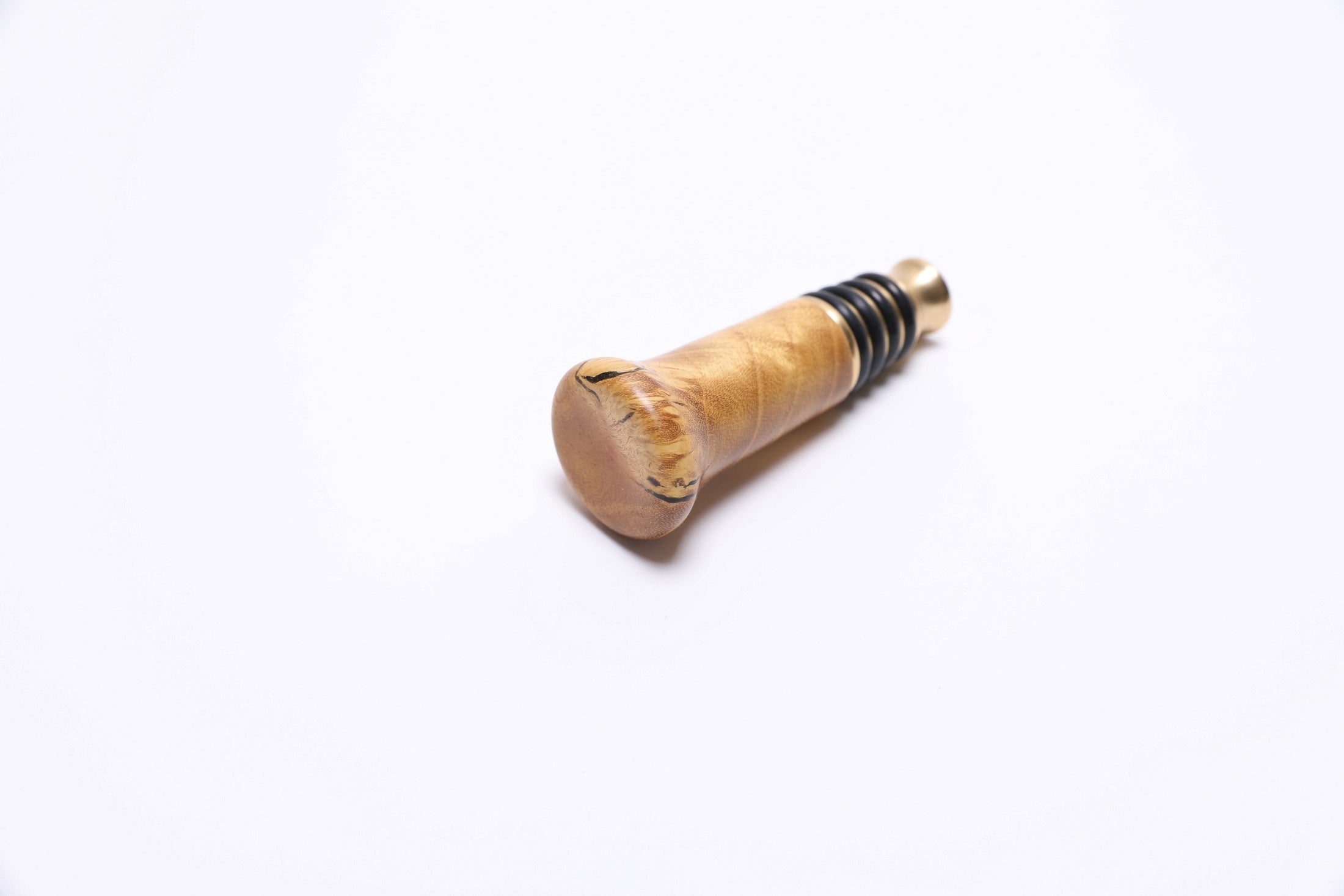 Side profile of mulberry burl wine stopper, 3¼ inches tall, handmade in North Carolina