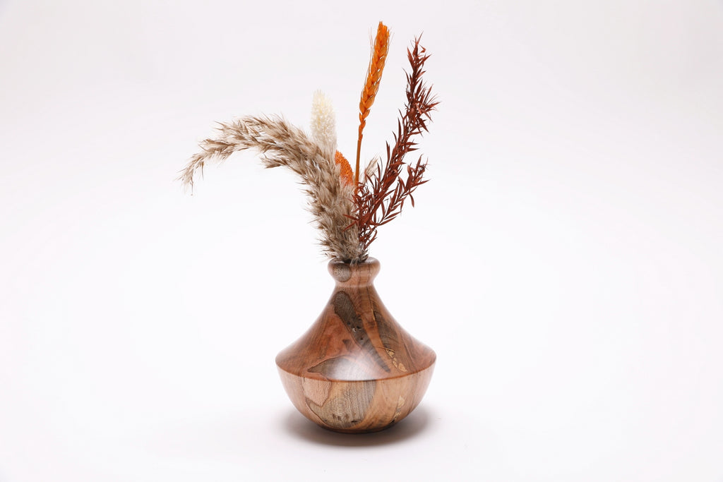 Handmade spalted ambrosia maple weed pot with dried flowers and Far East-inspired form and natural oil finish