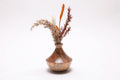 Handmade spalted ambrosia maple weed pot with dried flowers and Far East-inspired form and natural oil finish