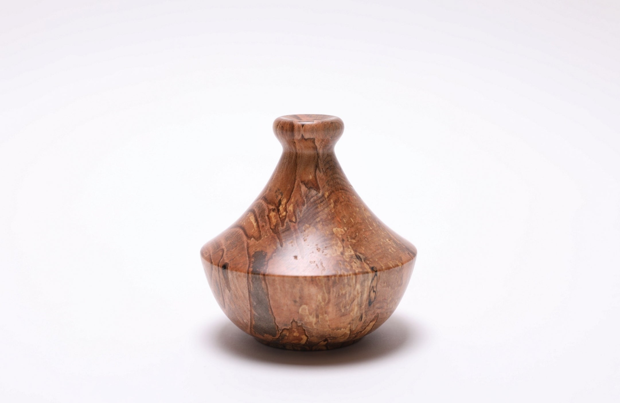 Side profile of spalted ambrosia maple weed pot, 4 inches by 3¾ inches, handmade in North Carolina