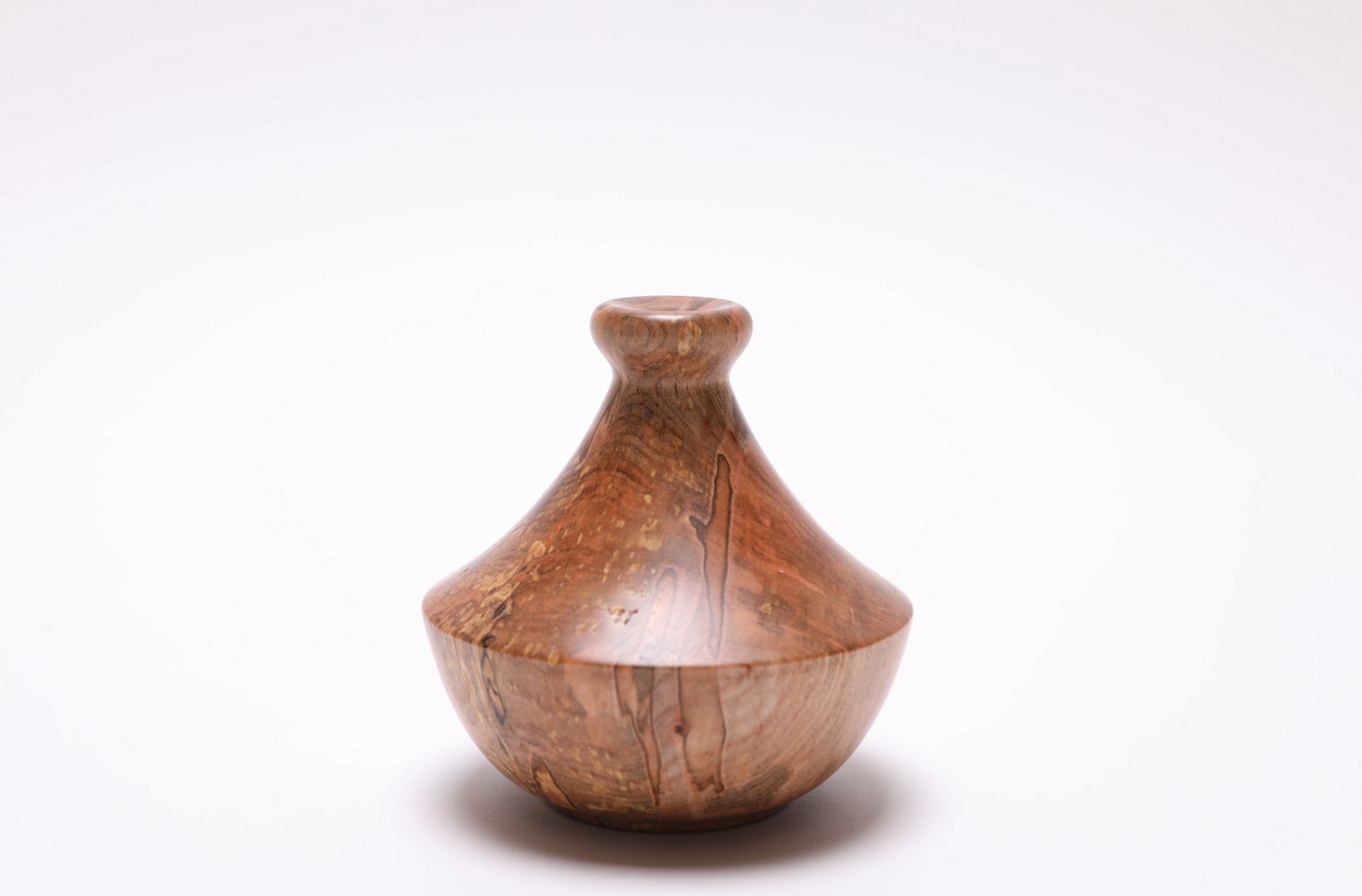 Detail of spalted ambrosia maple figure showing rich color variation and smooth finish