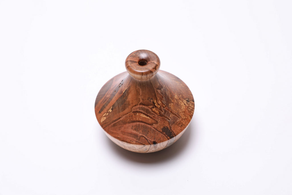 Top view of handcrafted spalted ambrosia maple dry vase, 4 inches diameter