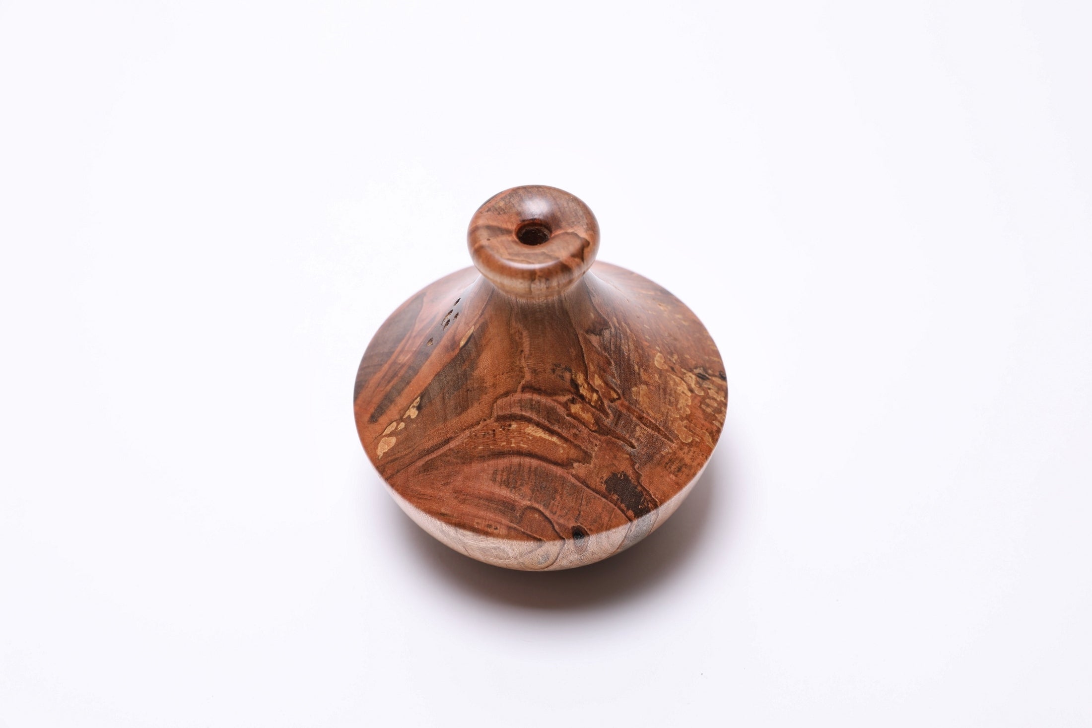 Top view of handcrafted spalted ambrosia maple dry vase, 4 inches diameter