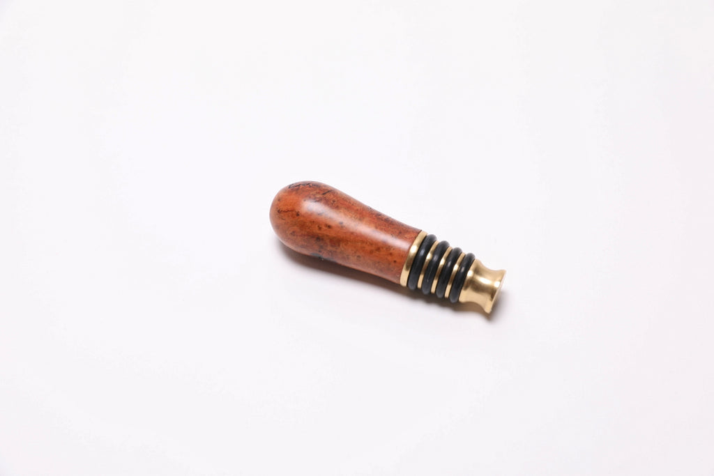 Side profile of wild black cherry burl wine stopper, 3½ inches tall, handmade in North Carolina