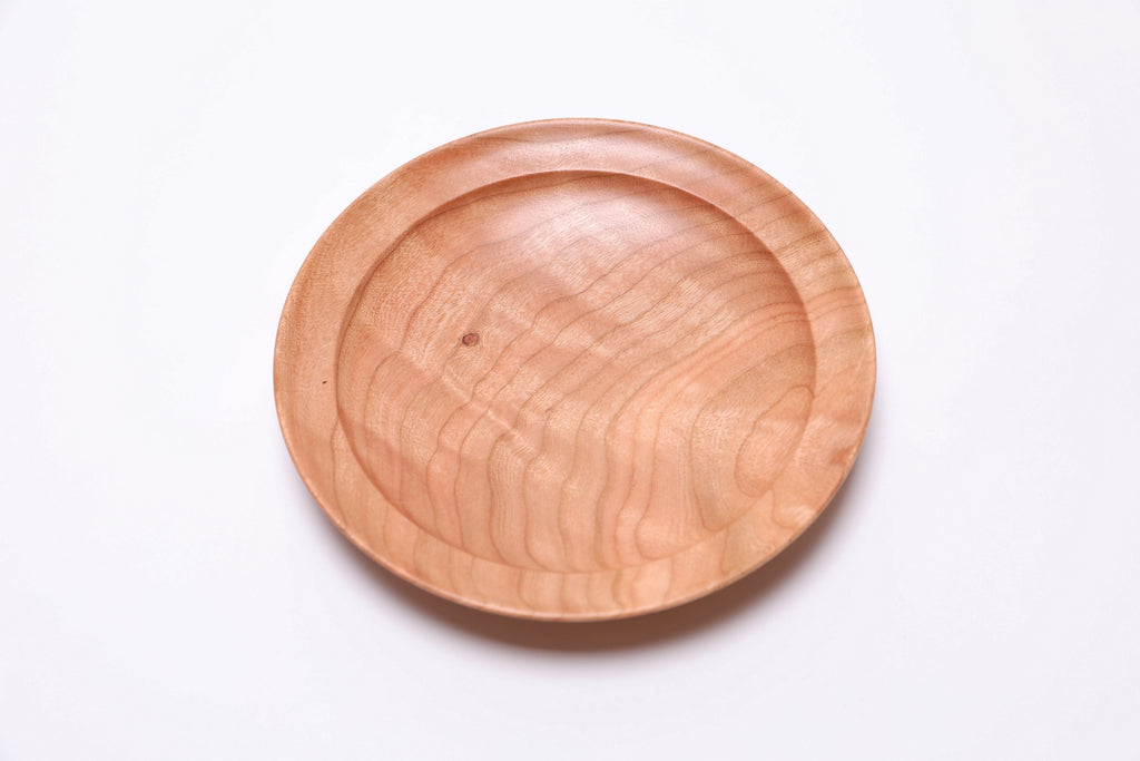 Undercut rim detail of wild black cherry wooden ring dish
