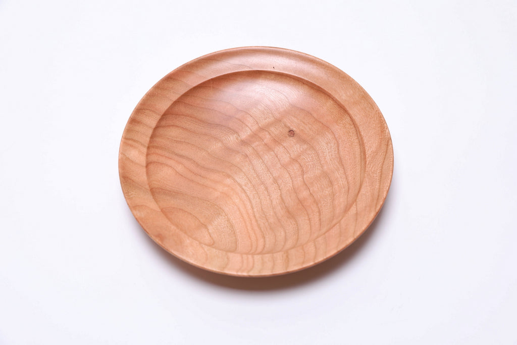 Interior of black cherry ring dish with smooth food-safe natural oil finish
