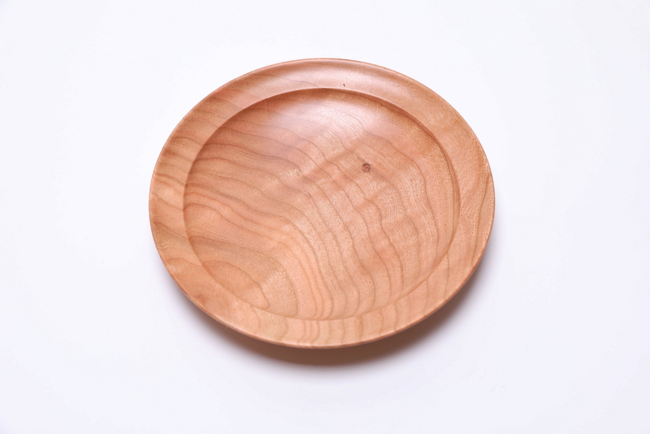 Interior of black cherry ring dish with smooth food-safe natural oil finish