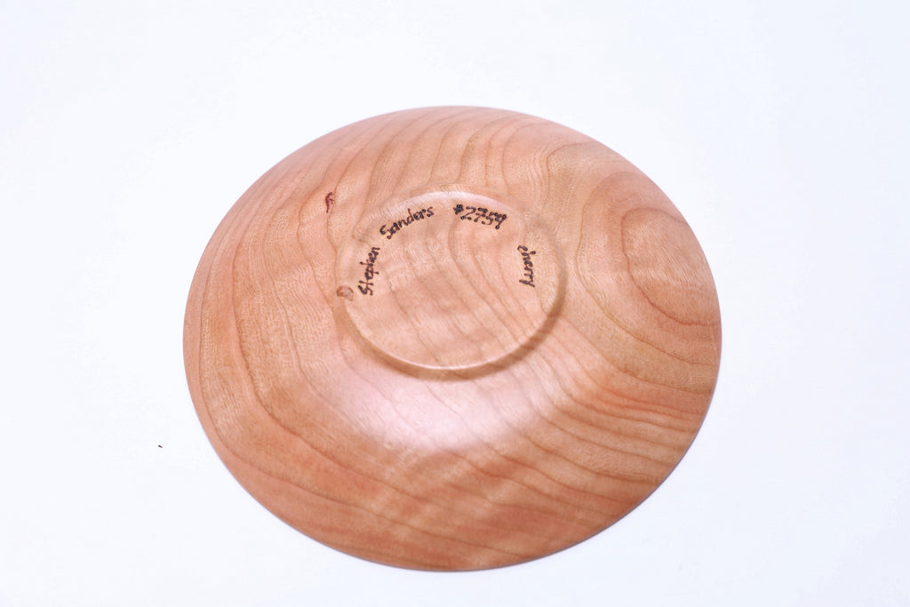 Upside down view of artisan-crafted wild black cherry ring dish made in USA with unique wood character