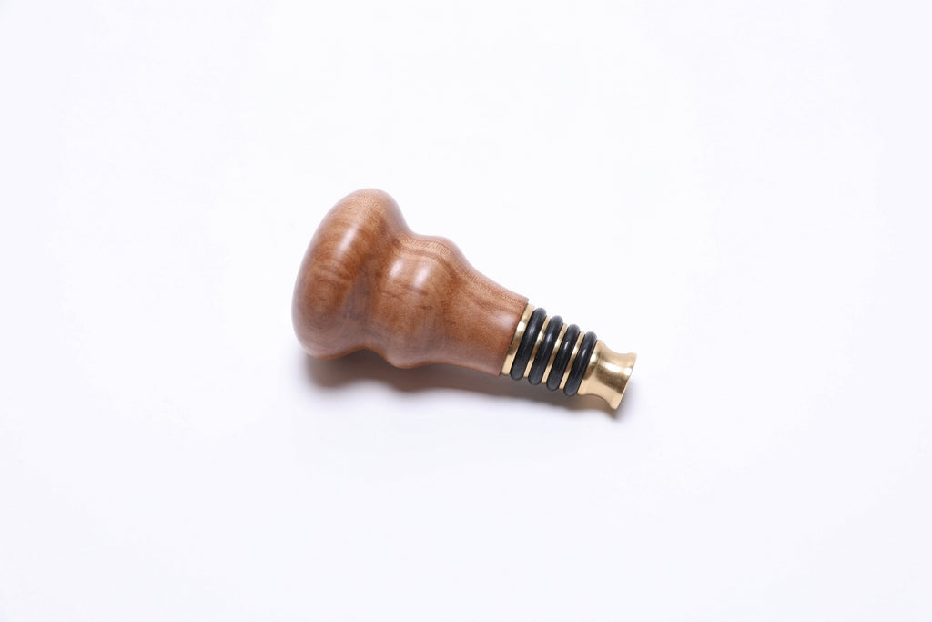 Brass Niles BR-9000 fitting with nitrile o-rings on handmade pear wood wine stopper