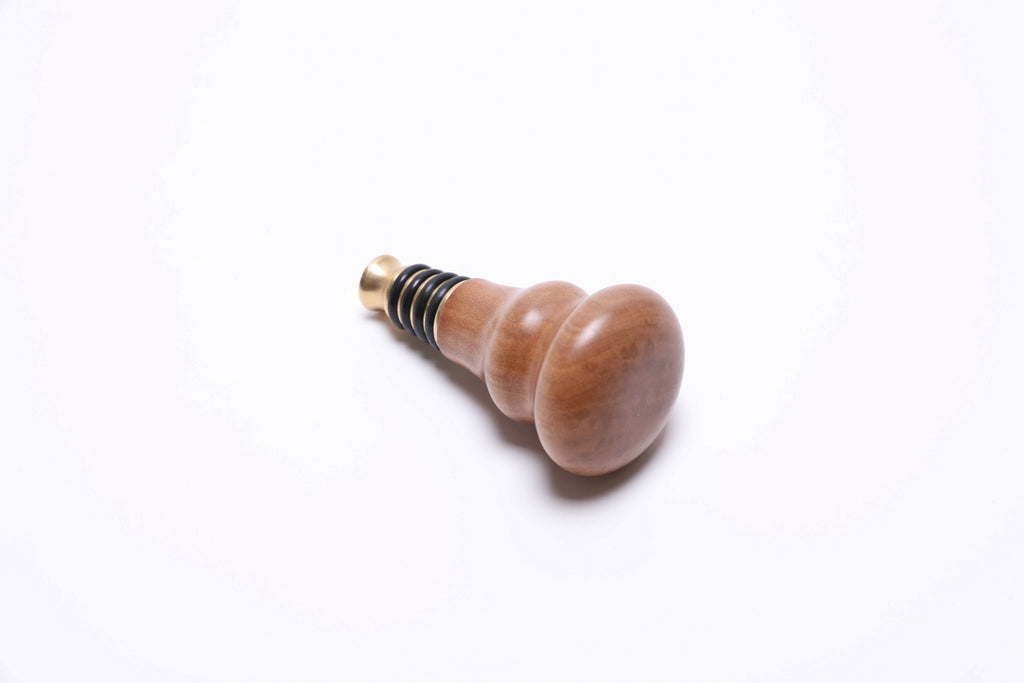 Detail of pear wood surface with smooth food-safe natural oil finish
