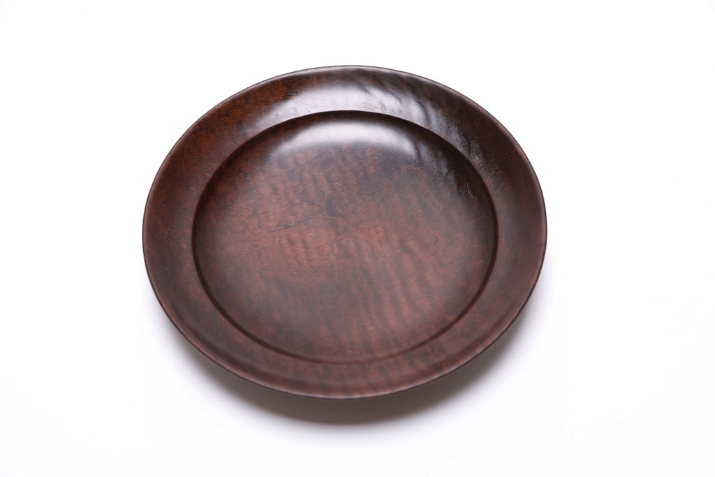 Roasted maple bowl showing tiger figure in raking light