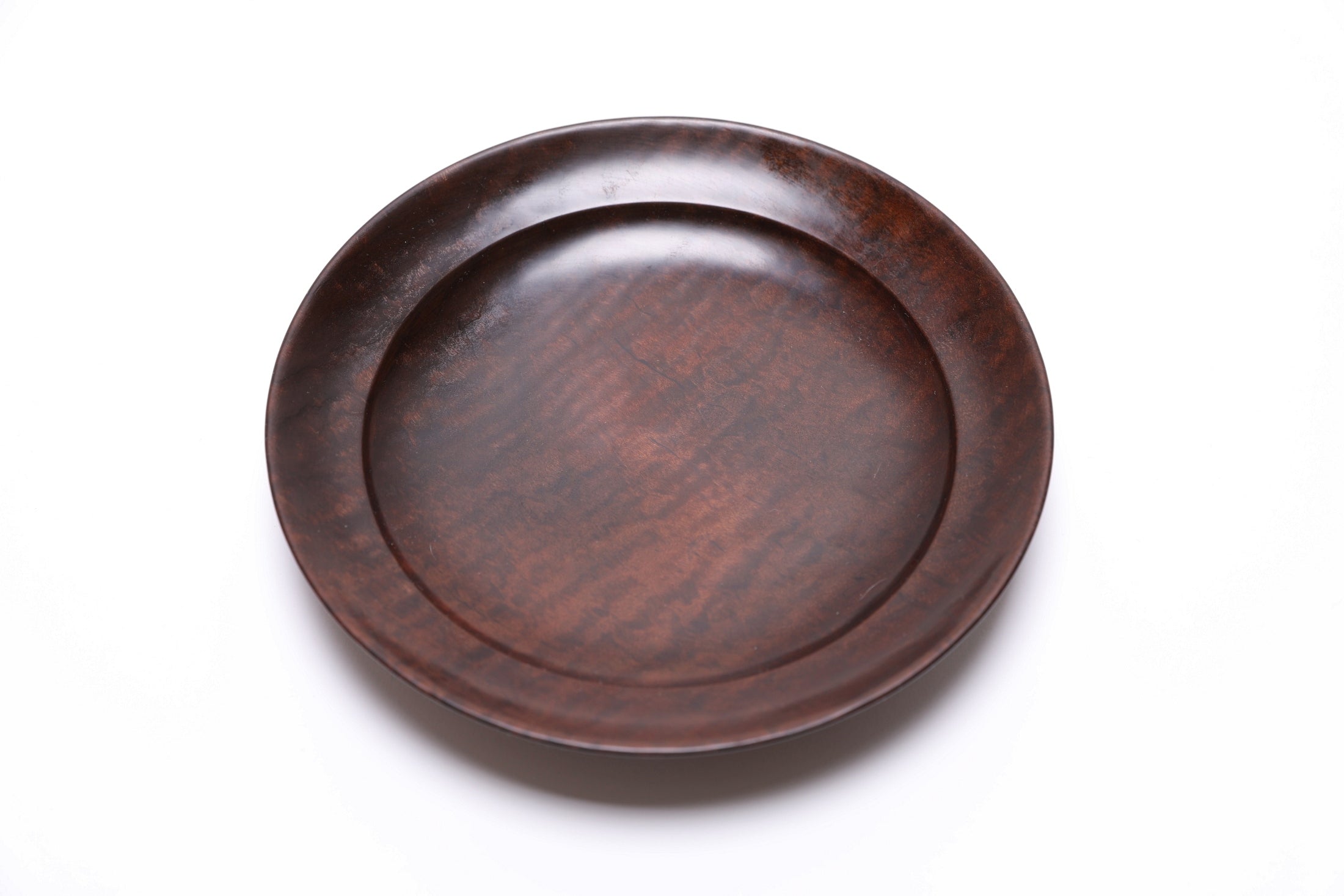 Handmade tiger maple bowl, close-up of chatoyant wood figure