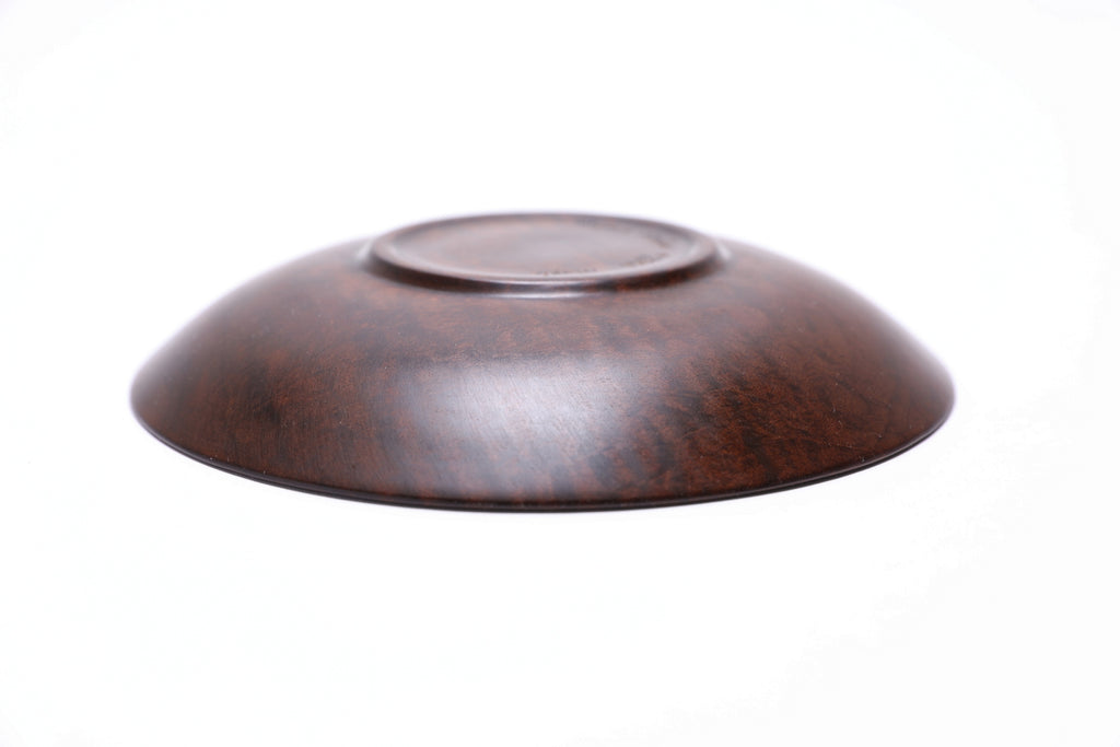 Upside down view of roasted maple bowl showing foot detail.