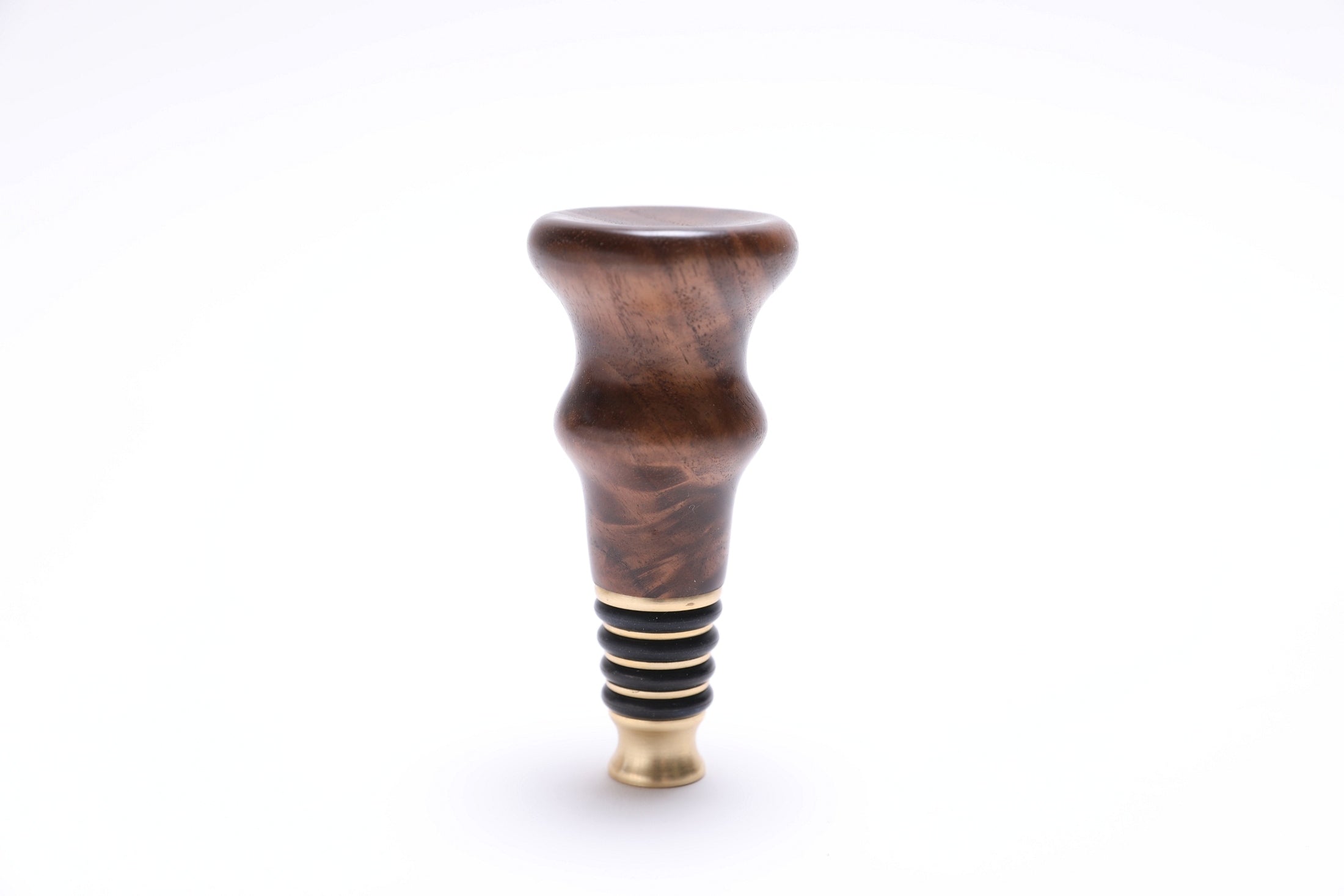 Walnut burl wine stopper standing upright, food-safe oil finish detail
