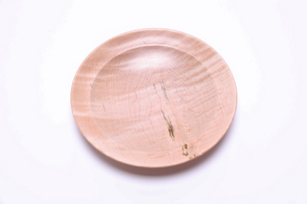 Tiger maple ring dish with undercut rim and raised foot, side profile