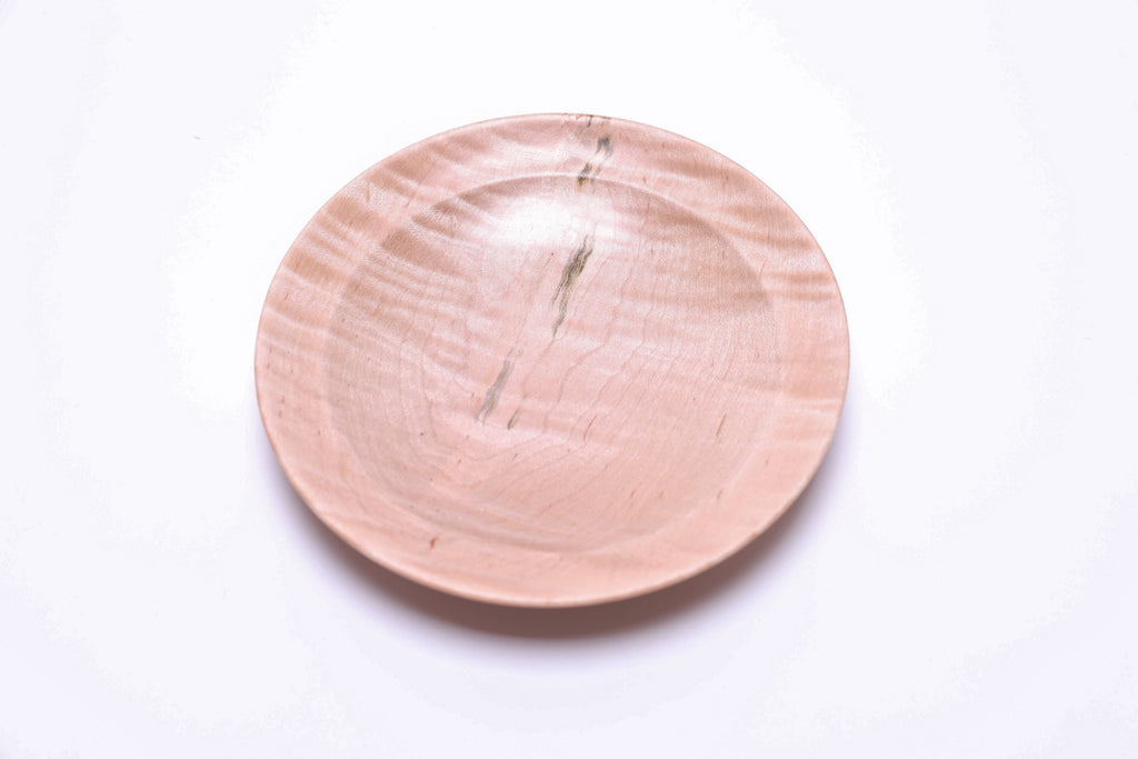 Handcrafted wooden ring dish in tiger maple, lifestyle detail shot