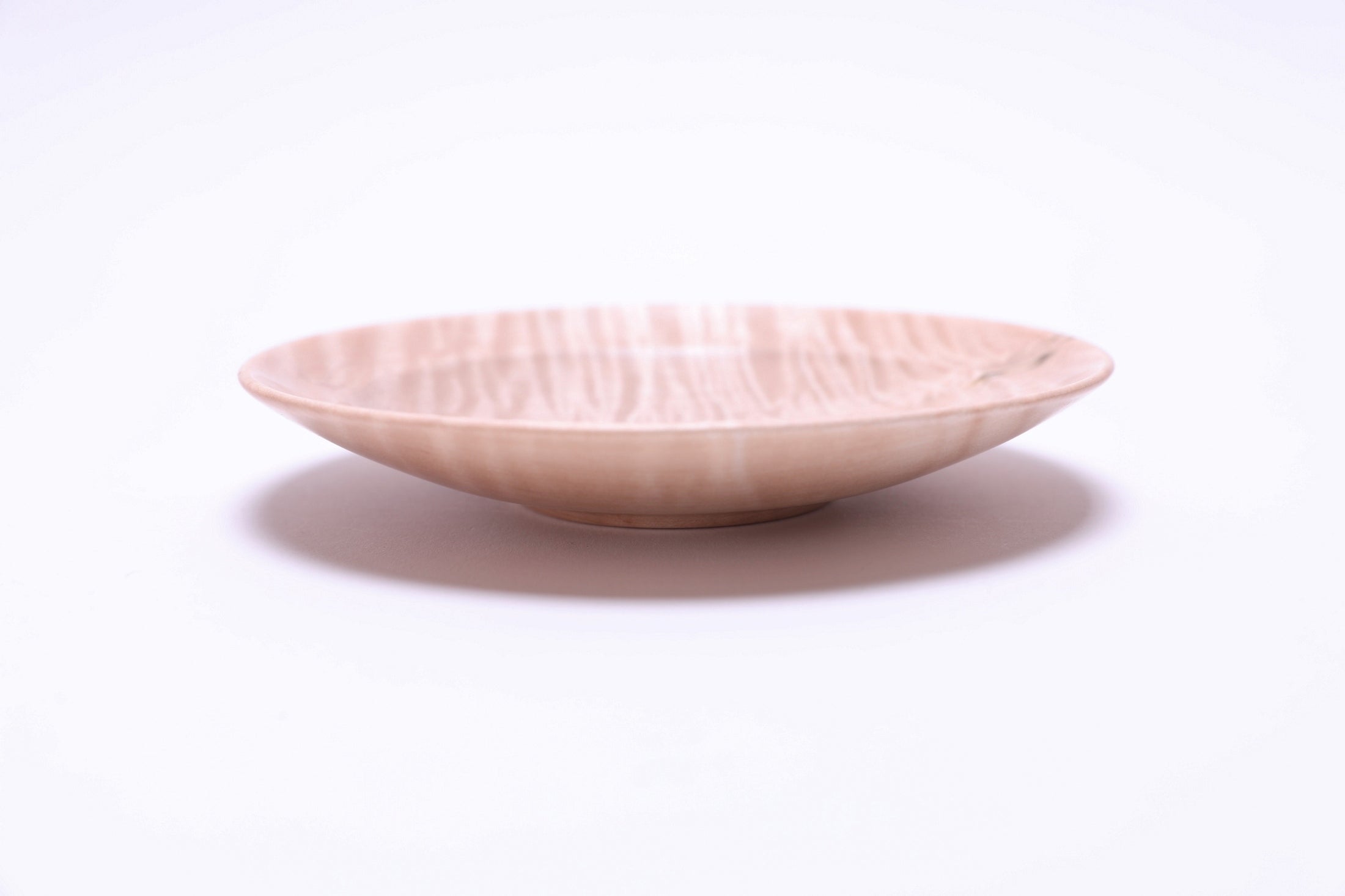 Side view Sanders Woodworking tiger maple ring dish, angled overhead view