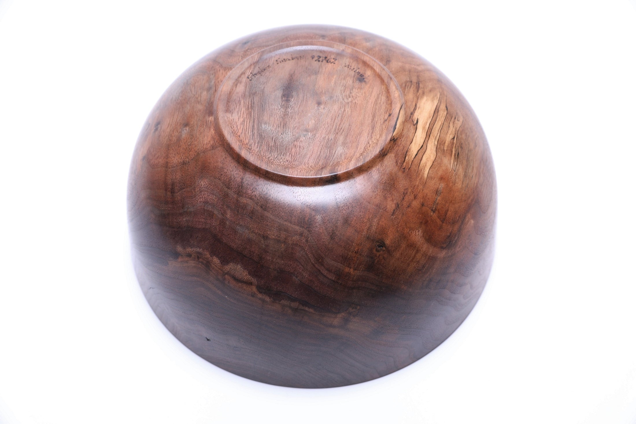 Handmade spalted curly black walnut wooden bowl showing spalting and raised foot, 10½ inch, Made in USA