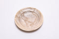Hackberry wooden ring dish showing curly grain and amber transition lines, top view