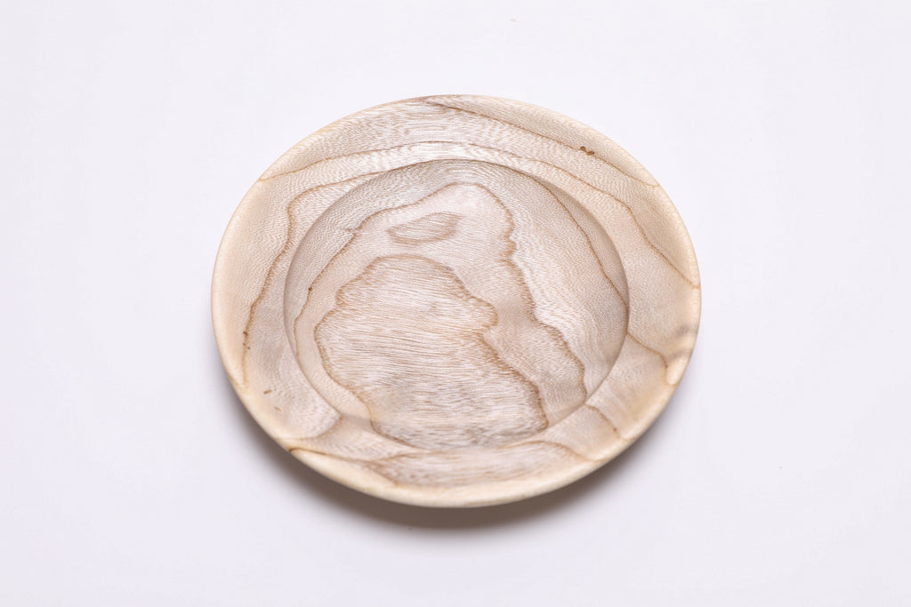 Hackberry ring dish with gold and gray tones highlighting the natural wood grain pattern