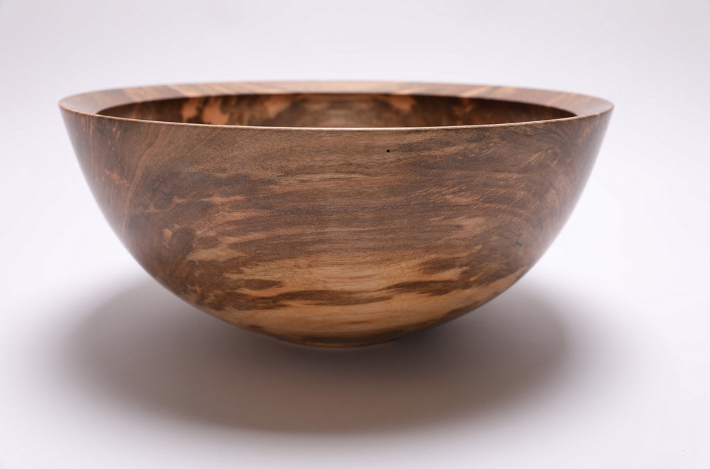 	Close-up of rounded-over undercut rim on spalted sugar maple bowl — handmade in North Carolina