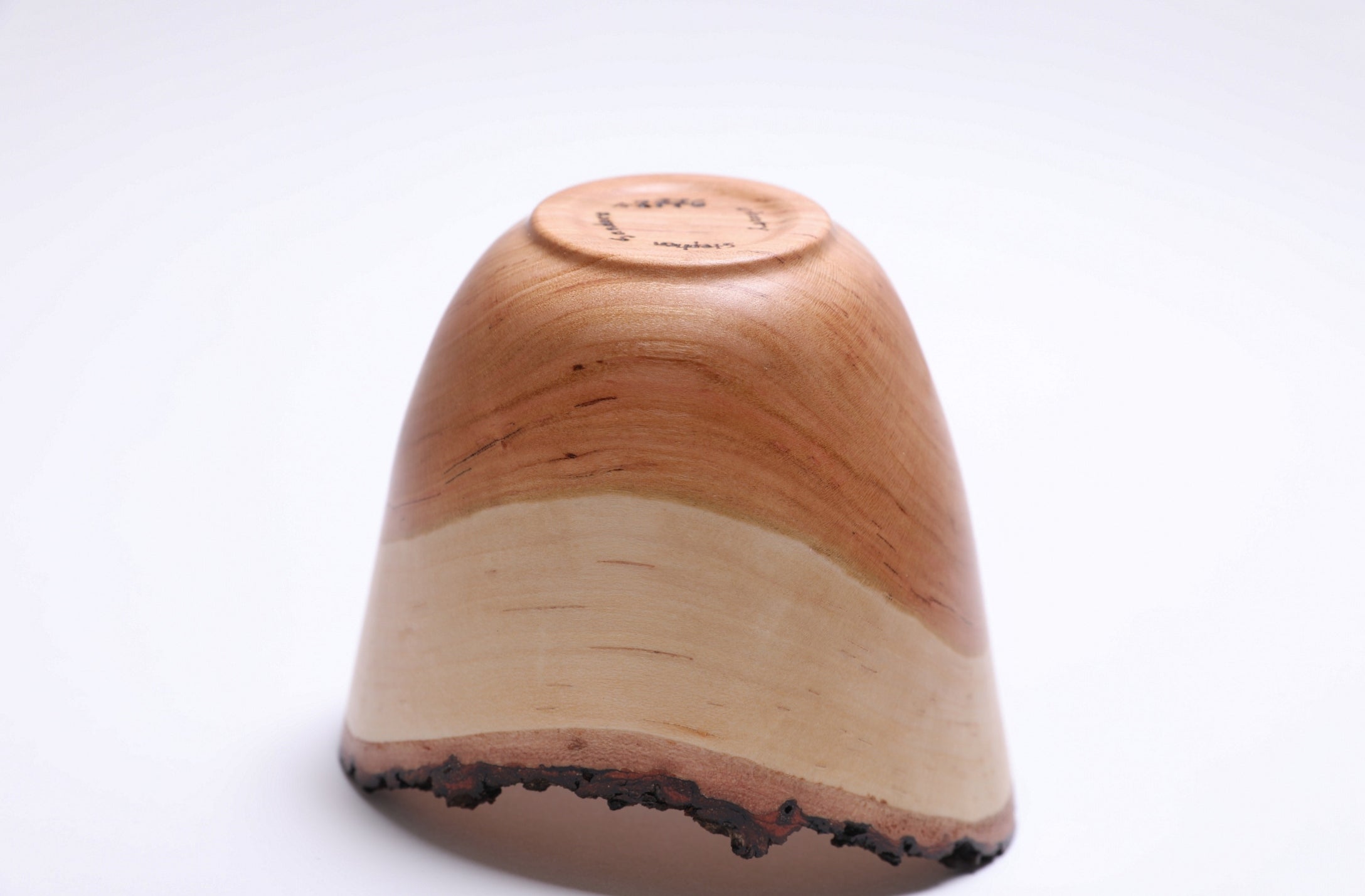 Bottom view of handmade wild cherry wood bowl – Sanders Woodworking