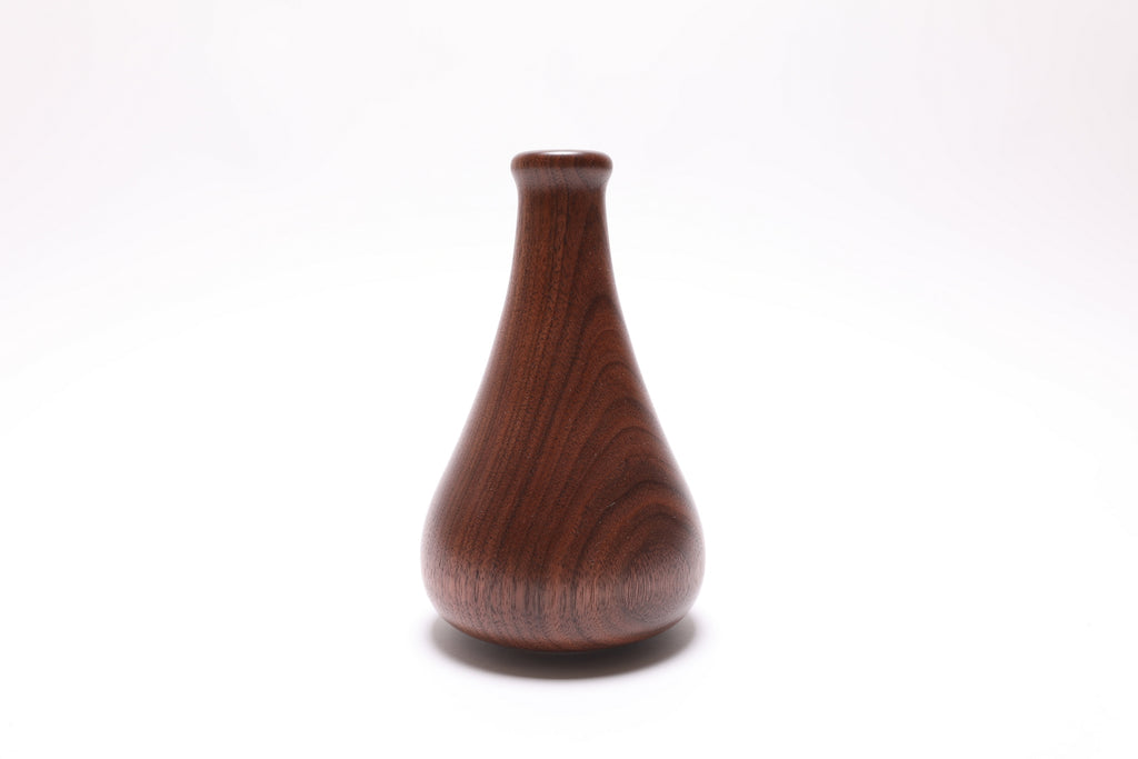 Elegant quartersawn walnut dry vase, close-up of grain and coloration