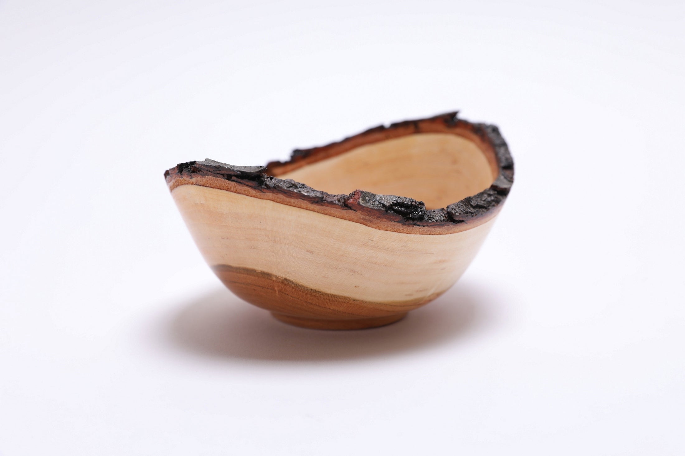 Handcrafted black cherry bowl with cream sapwood and copper heartwood detail