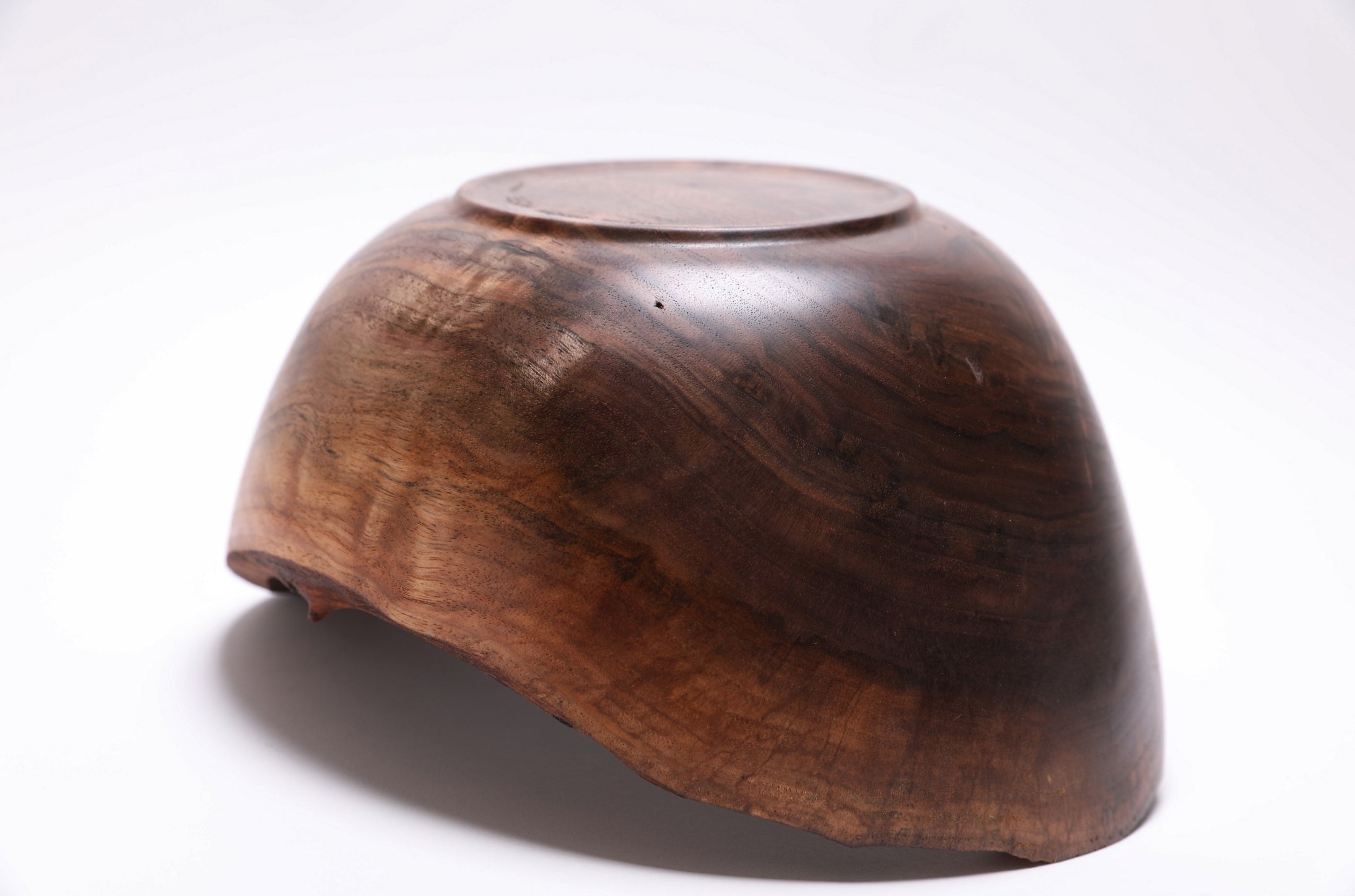 Spalted walnut bowl bottom view — foot and natural oil finish detail