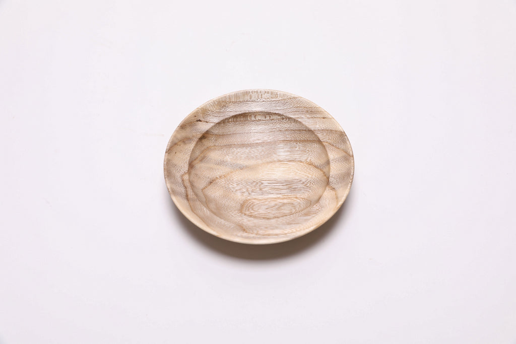 Handcrafted hackberry wooden ring dish — top view showing iridescent figure and cream background