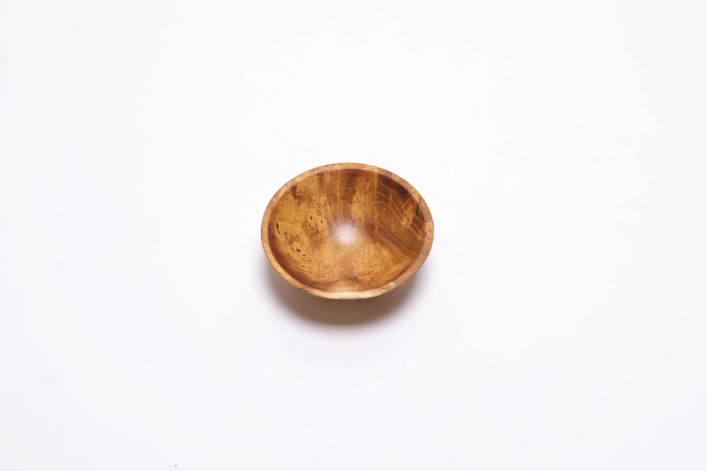 Top-down view of hand-turned mulberry burl bowl with food-safe oil finish