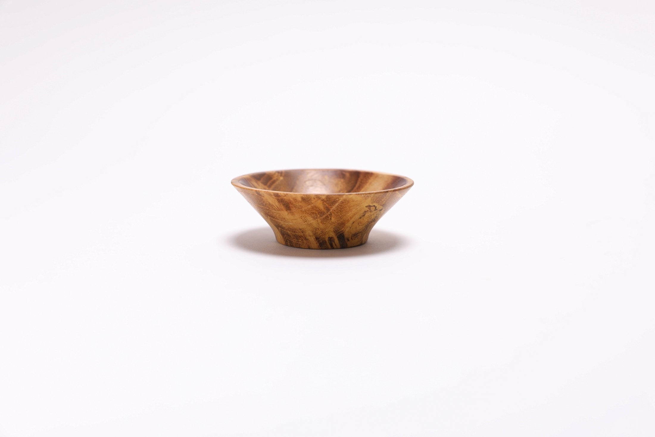 Mulberry burl wooden bowl angled view highlighting burl pattern